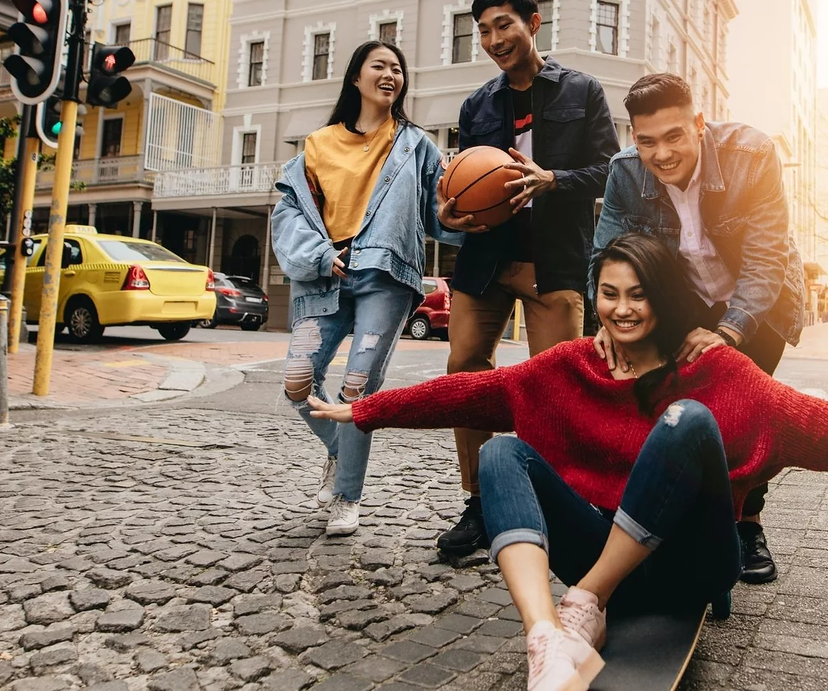 Friends sharing an experience together on a city street
